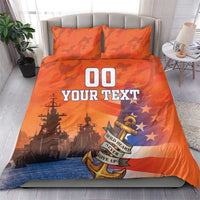 Orange camouflage bedding set with two pillows, '00 YOUR TEXT' and anchor badge in center