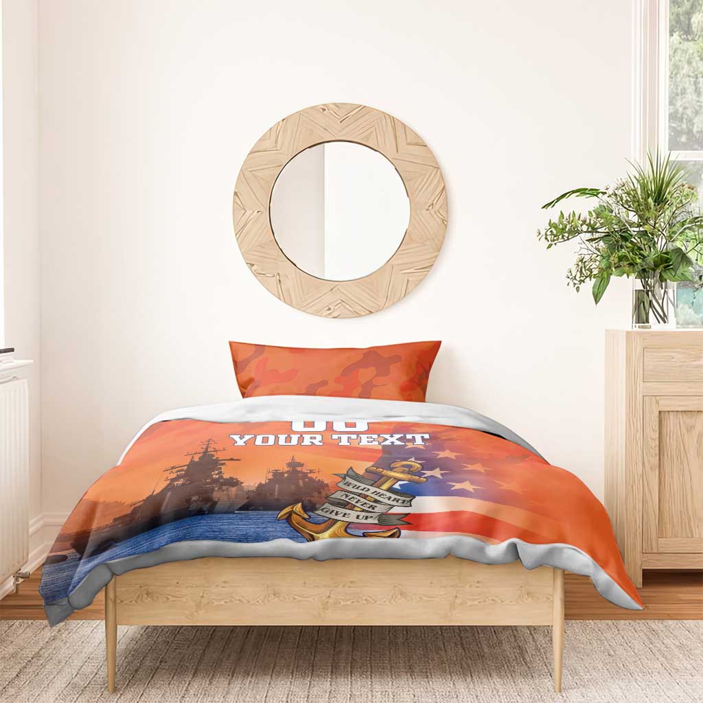 Orange camo bedding set on bed with two pillows, stars, anchor, and ship silhouettes