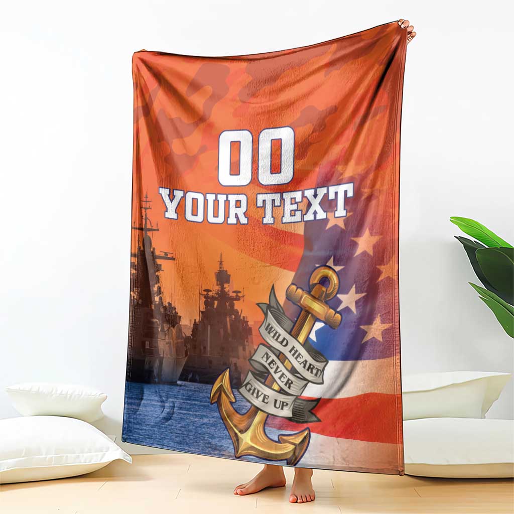 Orange custom US Navy veteran blanket held up, anchor, stars, and 'YOUR TEXT' design