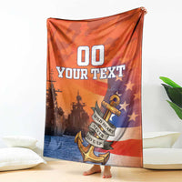 Orange custom US Navy veteran blanket held up, anchor, stars, and 'YOUR TEXT' design