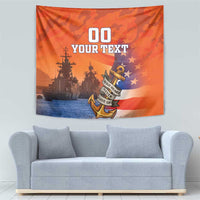 Orange camouflage tapestry featuring anchor emblem, battleship silhouettes, and “YOUR TEXT” line
