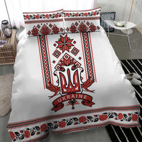 White duvet cover with red/black folk trident emblem and floral geometric border