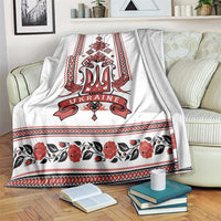 Ukraine unity day blanket with white base and red trident folk border and flowers