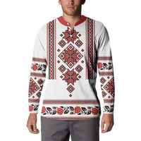 White crewneck sweatshirt with red collar, folk embroidered panel and patterned sleeves