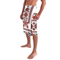 Red, black and white folk-print shorts, side view with all-over border pattern