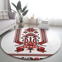 Round folk carpet rug with central trident and red UKRAINE text, bordered in geometric stripes