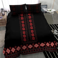 Black duvet with red vertical diamond motifs and red patterned hem border, paired shams