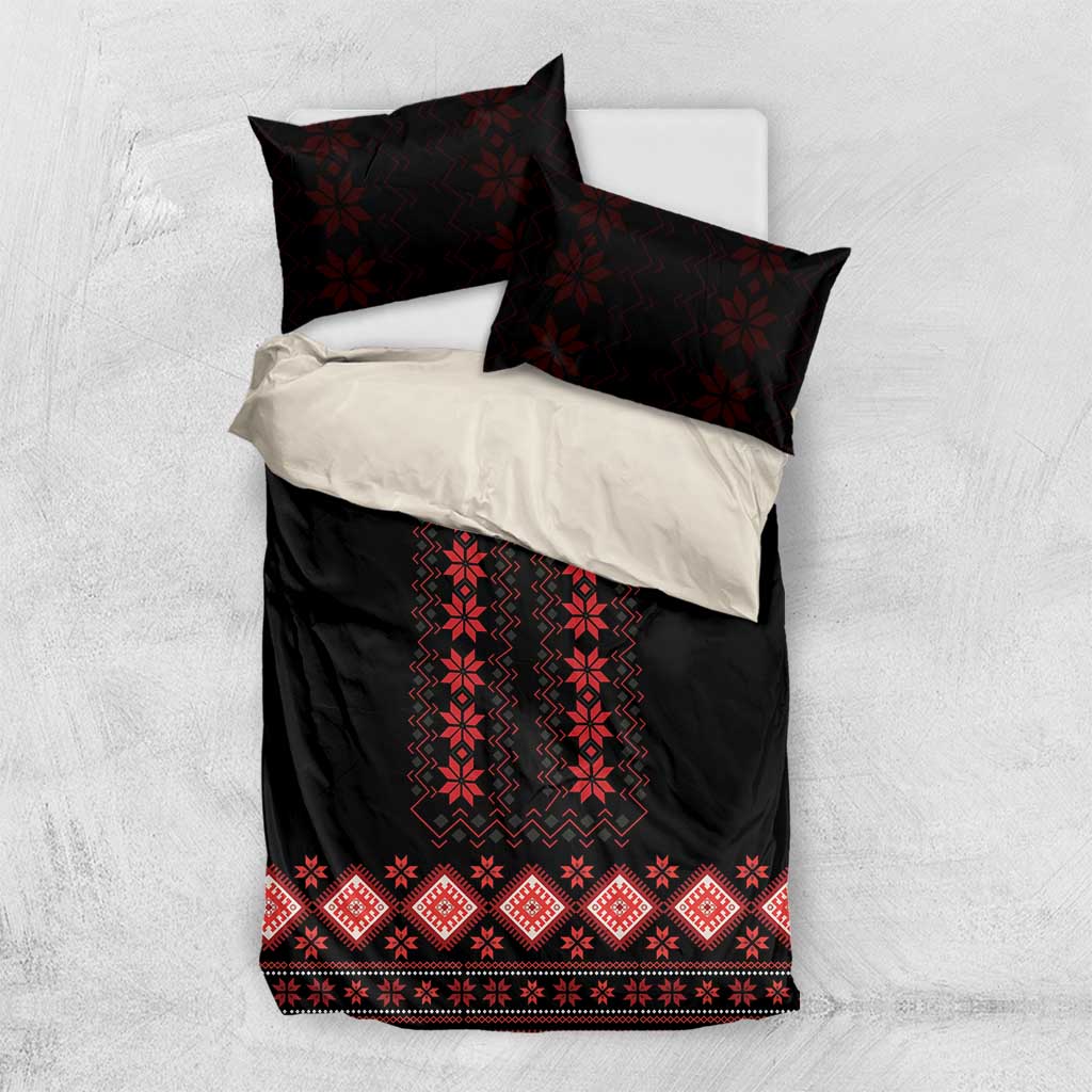 Black and red duvet bedding set with folk-style motifs and coordinating pillow shams