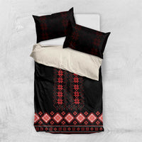 Black and red duvet bedding set with folk-style motifs and coordinating pillow shams