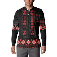 Black button front sweatshirt with red folk pattern, long sleeves and chest text