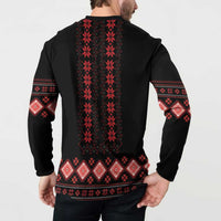 Black sweatshirt back with red vertical folk stripe and patterned hem border