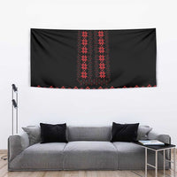 Black wall tapestry with red folk motif band across the bottom and vertical center design