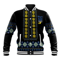 Black baseball jacket with yellow and blue folk patterned front, snap buttons and striped cuffs