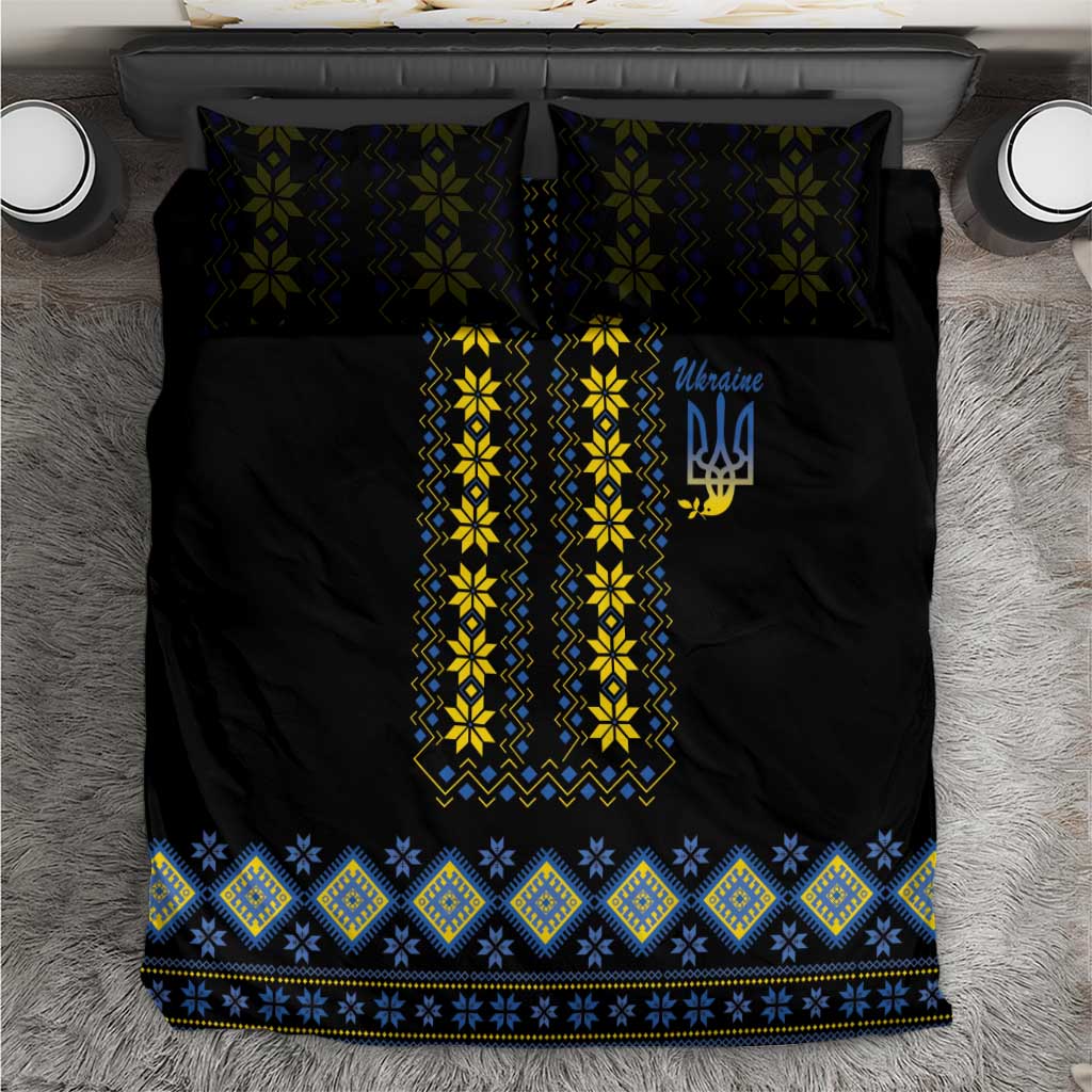 Black duvet cover with yellow, blue vertical folk embroidery border and matching pillow shams