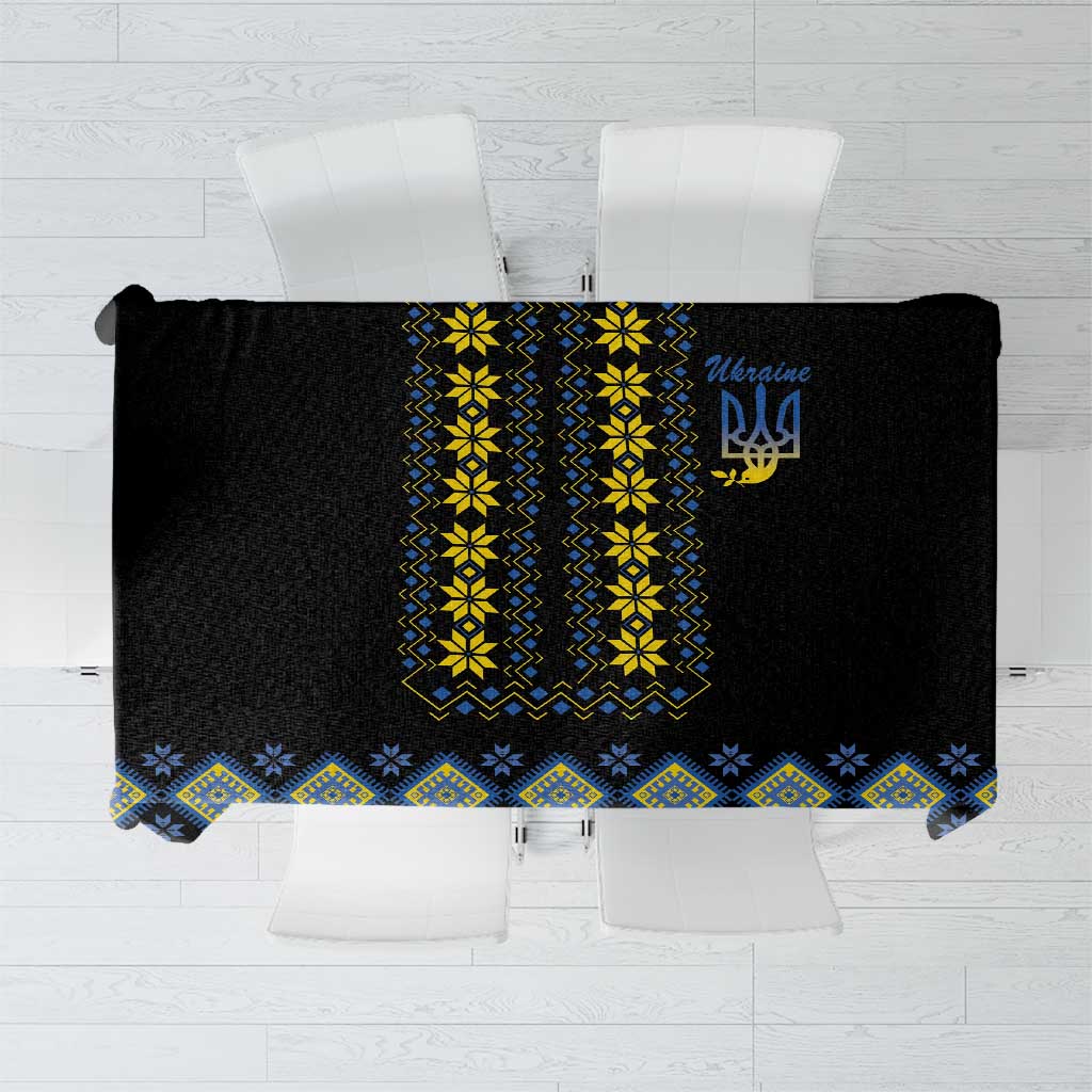 Rectangular tablecloth with black base and blue-yellow folk pattern panel