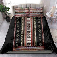 Black bedding set with multicolor folk stripes, central diamond motifs, and pillowcases