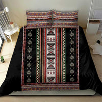 Black folk bedding set with colorful border trim and vertical pattern panels
