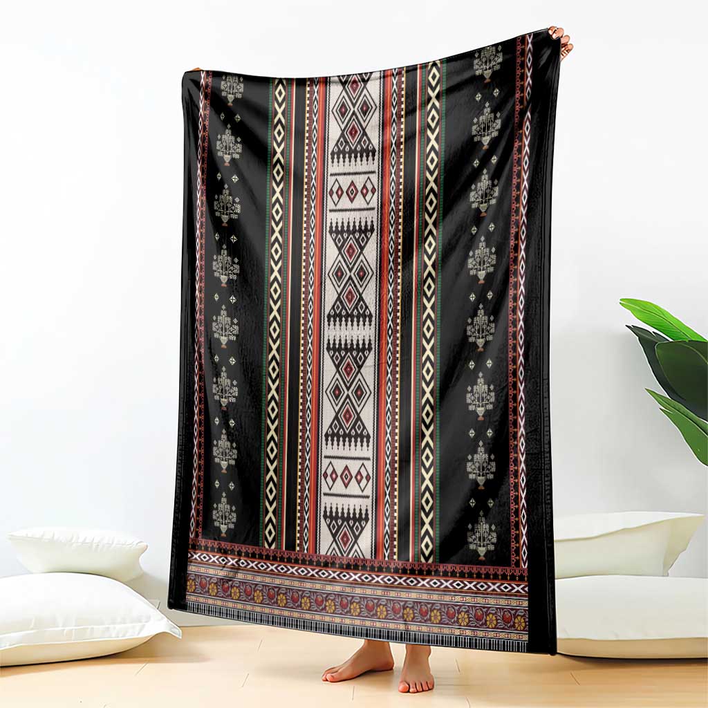Black folk pattern throw blanket with central diamond motifs and multicolor border