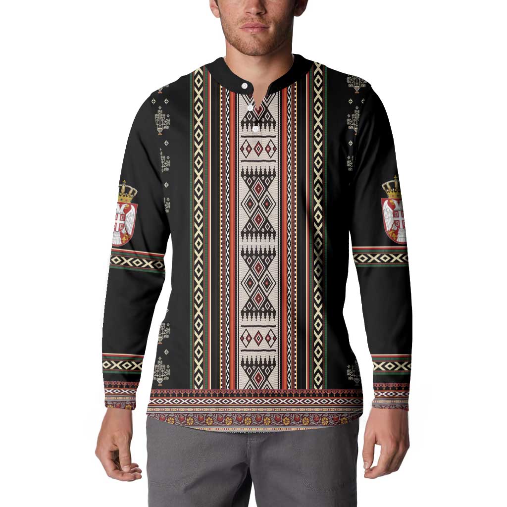 Black crewneck long-sleeve sweatshirt with folk stripe front and crest patch sleeves