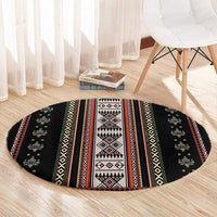 Round black folk-pattern carpet with central white panel and red and green stripe borders