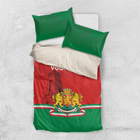 Personalized bedding set laid flat: red duvet, green pillowcases, “YOUR TEXT,” crest