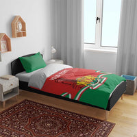 Personalized bedding set in bedroom: red-and-green duvet with “YOUR TEXT” and Bulgarian crest