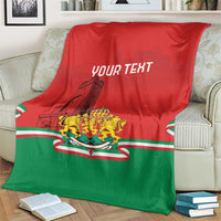 Personalized Bulgaria flag blanket draped on a sofa, red-green with crest and "YOUR TEXT"