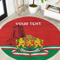 Red round carpet with emblem, monument graphic, and YOUR TEXT.