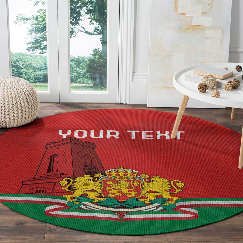 Red round carpet with emblem center, striped band, and YOUR TEXT across top.