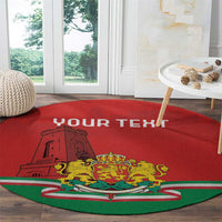 Red round carpet with emblem center, striped band, and YOUR TEXT across top.