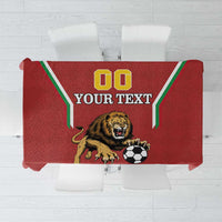Red football tablecloth showing lion, soccer ball, and "GO YOUR TEXT" layout