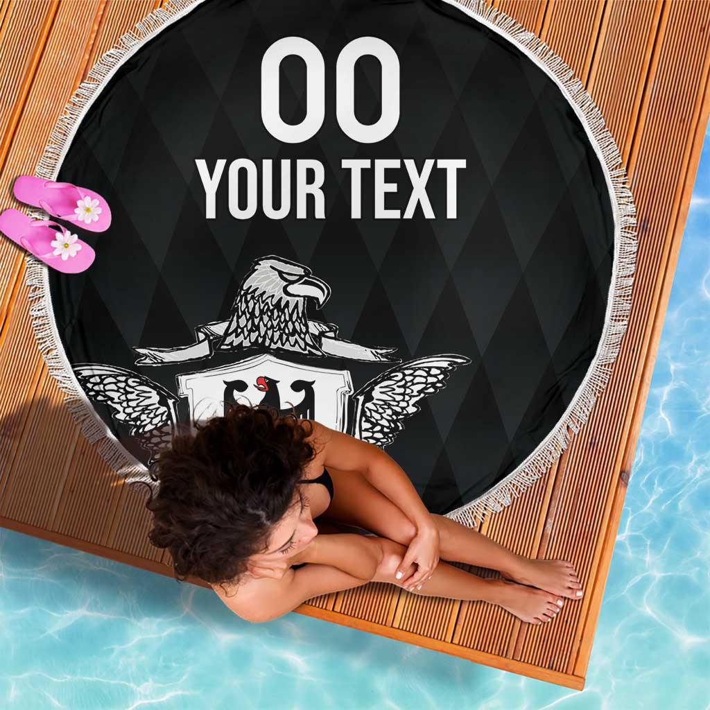 Black round beach blanket with fringe, '00 YOUR TEXT' and eagle crest shield graphic