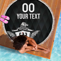 Black round beach blanket with fringe, '00 YOUR TEXT' and eagle crest shield graphic