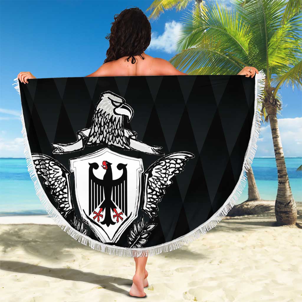 Round black beach blanket with white fringe edge and eagle crest shield, '00 YOUR TEXT'