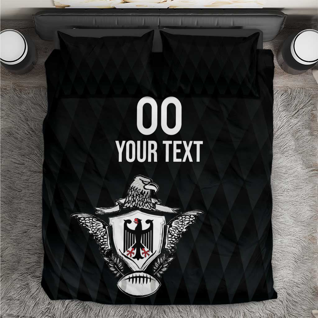 Black bedding set with two pillows and eagle crest graphic, with “00 YOUR TEXT”.