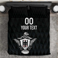 Black bedding set with two pillows and eagle crest graphic, with “00 YOUR TEXT”.