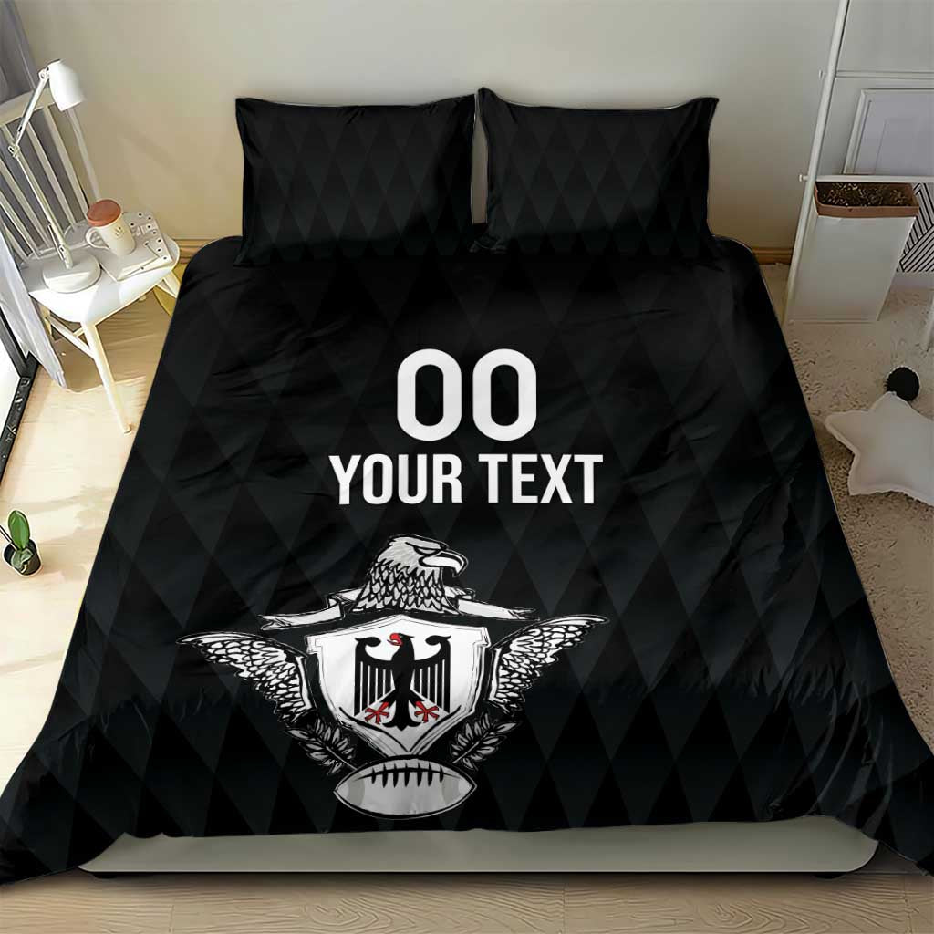 Black bedding set with comforter and two pillows featuring “00 YOUR TEXT” and eagle crest.