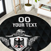 Black round rug with eagle crest and 'OO YOUR TEXT' print