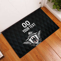 Black rubber doormat with eagle crest and space for “Your Text”