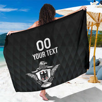 Black geometric-pattern sarong with eagle crest and 'YOUR TEXT' print