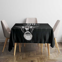 Black rugby tablecloth on a small square table with eagle and rugby ball design