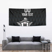 Black rugby tapestry with large eagle crest and '00 YOUR TEXT' header