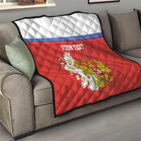 Red quilt blanket with white top, blue stripe, “YOUR TEXT”, and eagle coat of arms