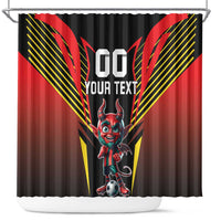 Black shower curtain with red devil mascot and soccer ball, yellow diagonal stripe graphics