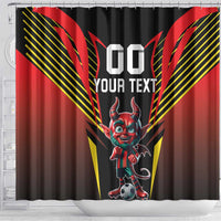 Black shower curtain with red devil mascot and soccer ball, yellow stripe wings graphic