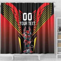 Black shower curtain panel with centered red devil mascot and soccer ball, yellow diagonal accents