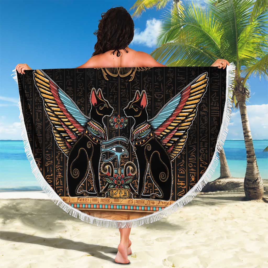 Round black beach blanket with gold scarab beetle and hieroglyphs, white fringe border