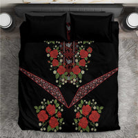 Black bedding set with red floral embroidery, diamond center panel, and patterned border