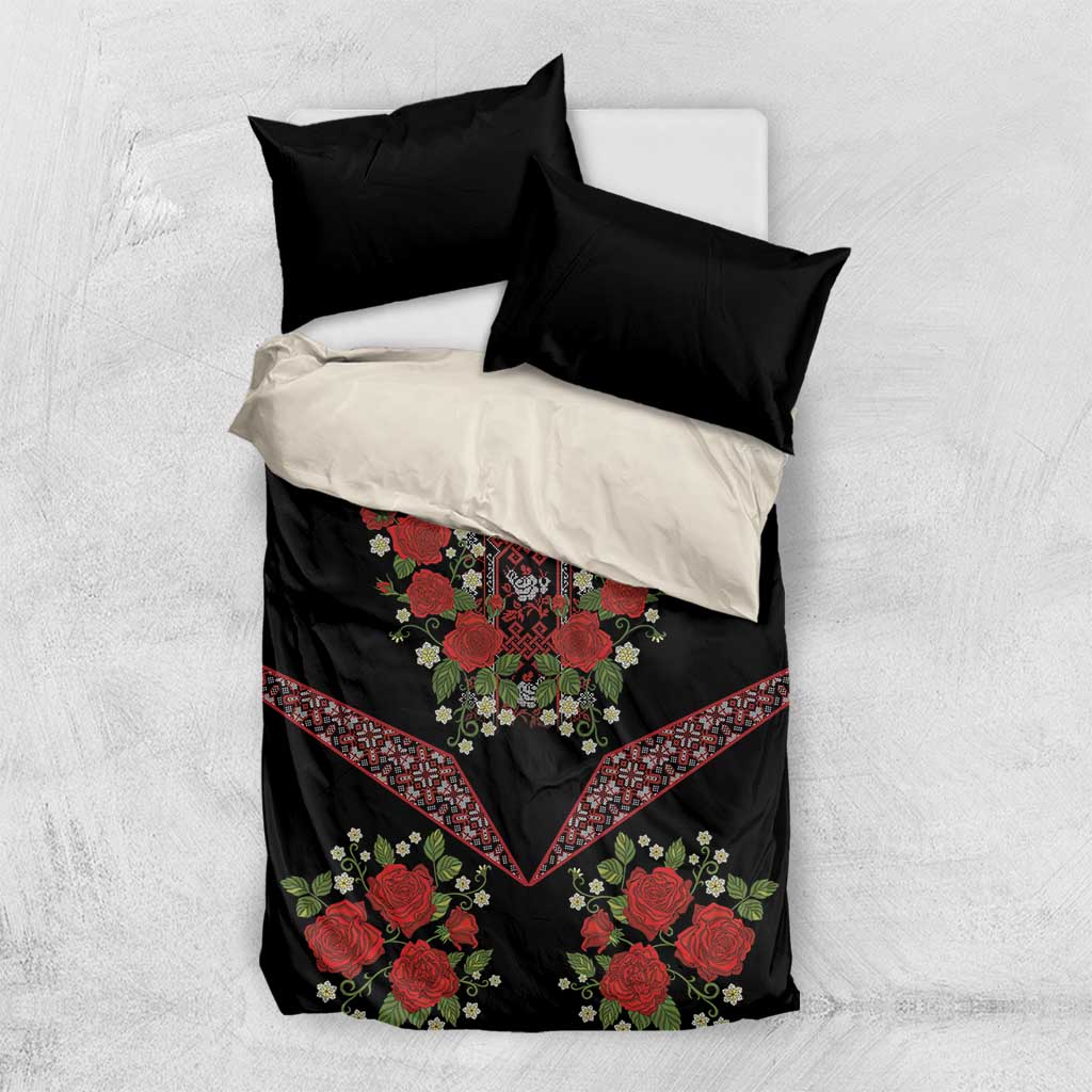 Black bedding set with red floral embroidery center panel and patterned side borders