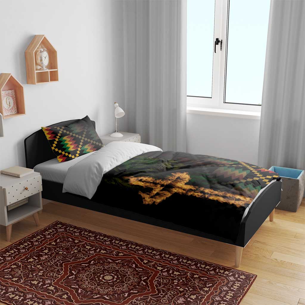 Black bedding set with lion face and flame cross print, styled with two multicolor pillows